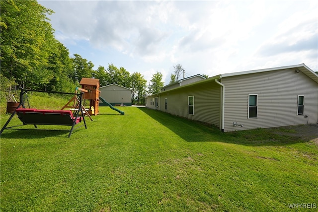 view of yard with a playground