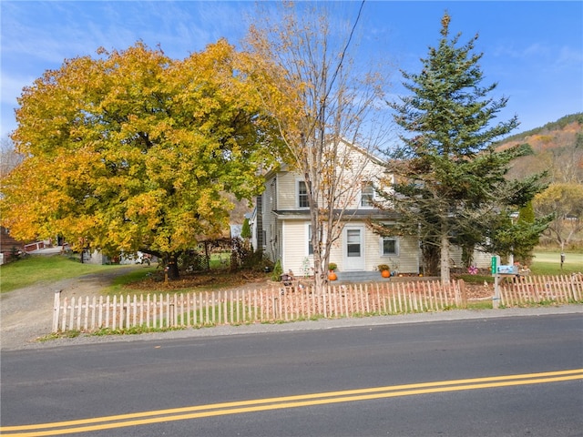 1793 County Highway 9, Davenport, NY 12197 - view of property hidden behind natural elements with a fenced front yard