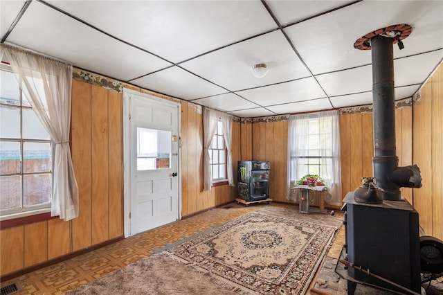 1793 County Highway 9, Davenport, NY 12197 - entrance foyer featuring a wood stove and wooden walls
