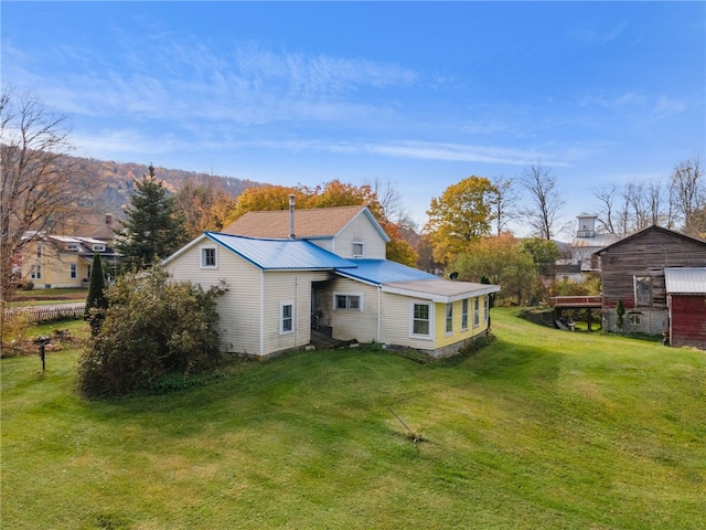 1793 County Highway 9, Davenport, NY 12197 - back of property with a lawn and a metal roof
