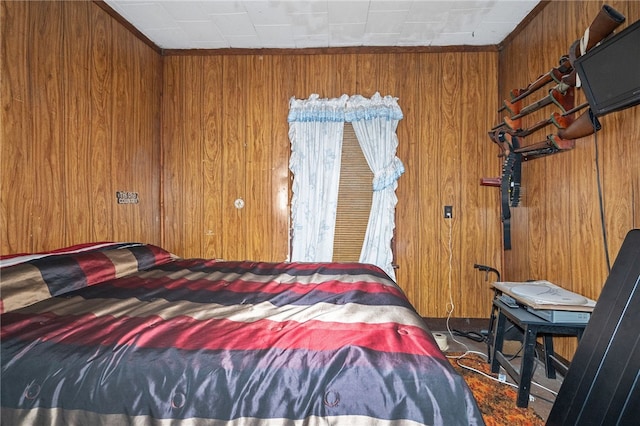 bedroom featuring wooden walls