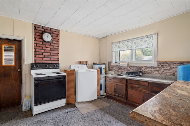 kitchen featuring tasteful backsplash, carpet, and electric range