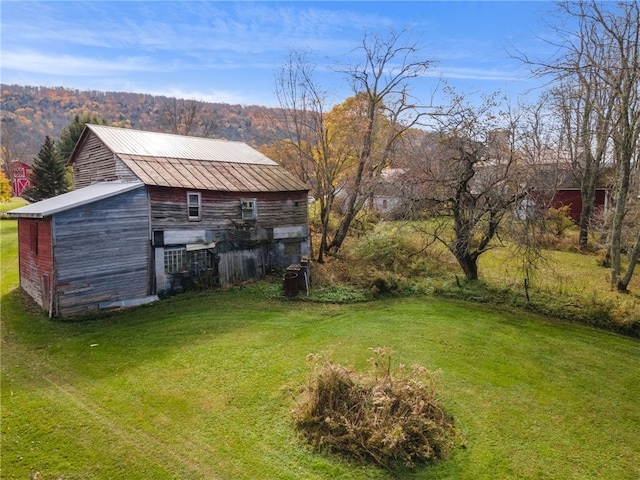 1793 County Highway 9, Davenport, NY 12197 - view of grassy yard featuring a barn and an outdoor structure