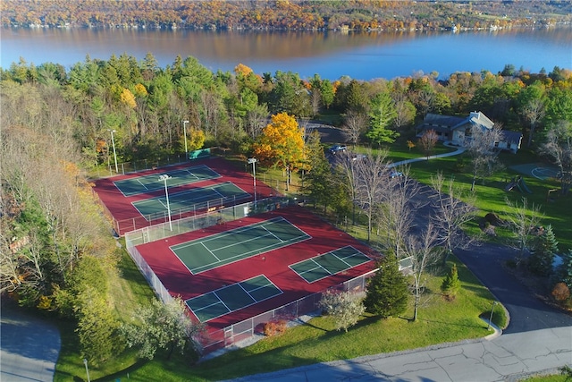 birds eye view of property featuring a water view