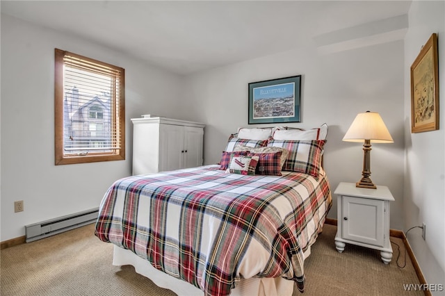 carpeted bedroom with a baseboard radiator