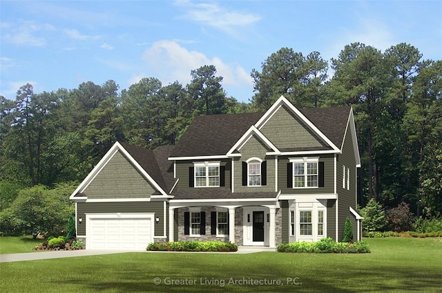 view of front of property with a garage and a front yard