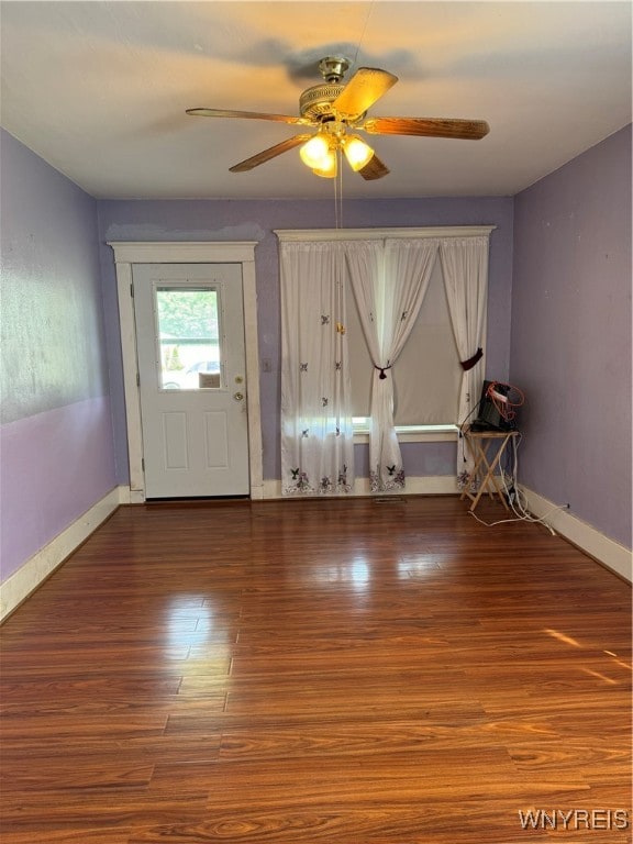 foyer featuring ceiling fan and hardwood / wood-style floors