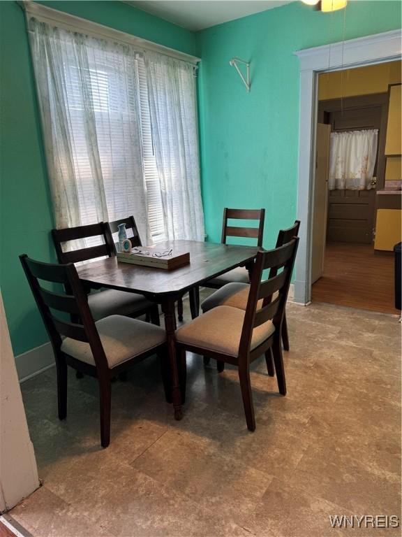 view of tiled dining space