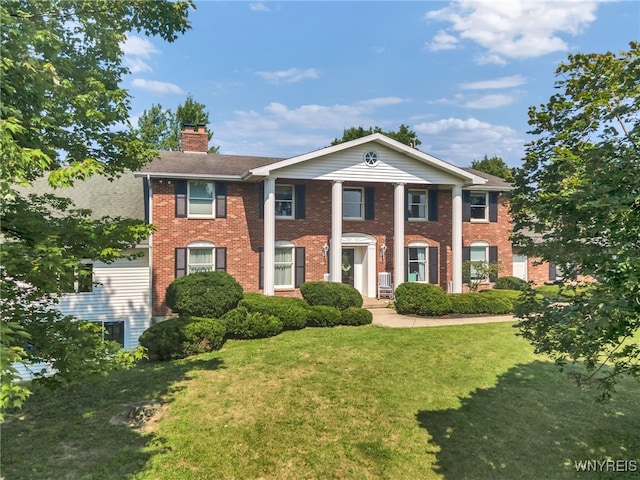 view of front of property with a front lawn