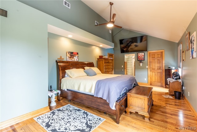 bedroom with ceiling fan, high vaulted ceiling, and light hardwood / wood-style floors