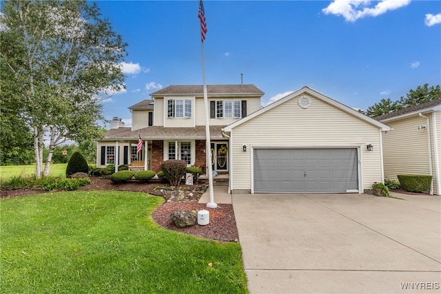 front of property featuring a garage and a front yard