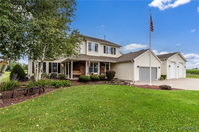 view of property with a garage and a front yard