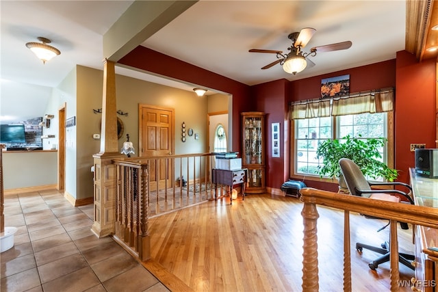 office space featuring light wood-type flooring and ceiling fan