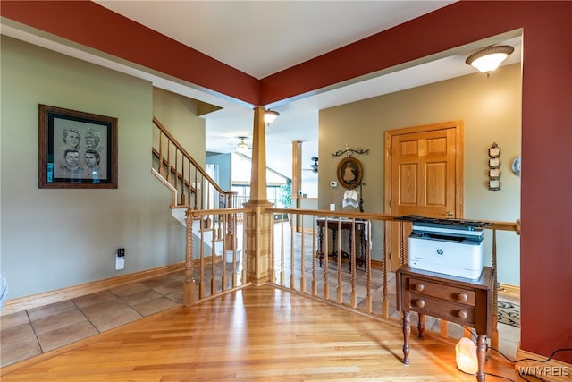 interior space with light hardwood / wood-style floors and ceiling fan