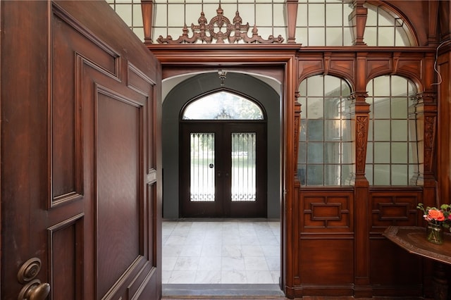 foyer entrance featuring french doors