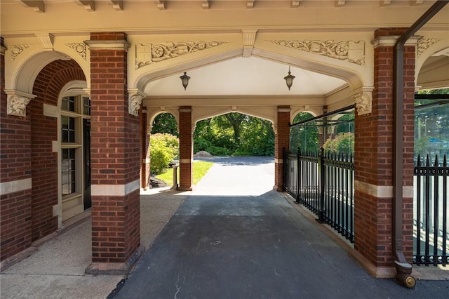 935 E Ave, Rochester, NY 14607 - view of patio featuring asphalt driveway