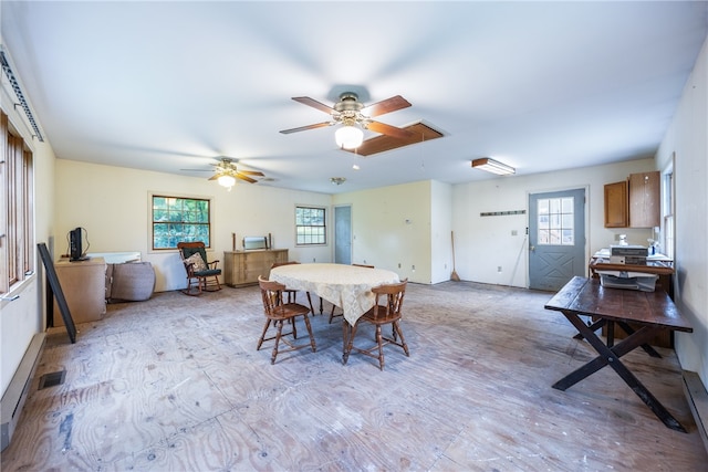 dining area featuring ceiling fan and plenty of natural light