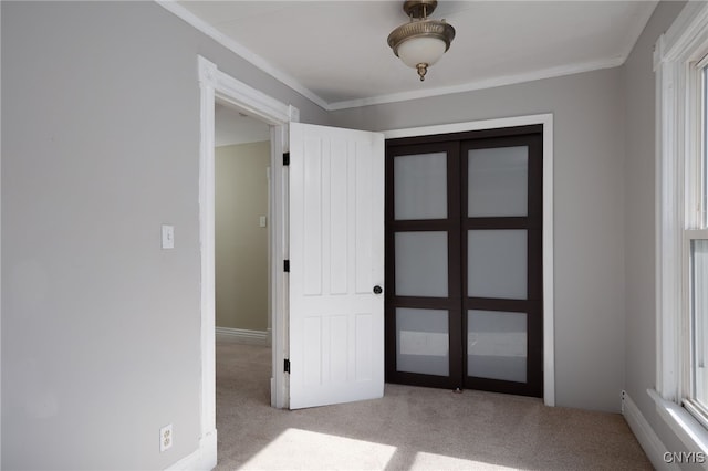 interior space with plenty of natural light and crown molding