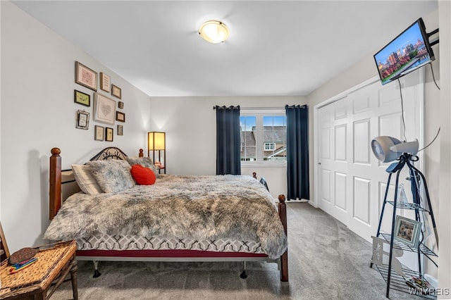 carpeted bedroom featuring a closet