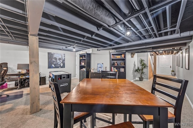 view of carpeted dining space