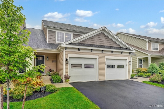 craftsman house featuring a garage