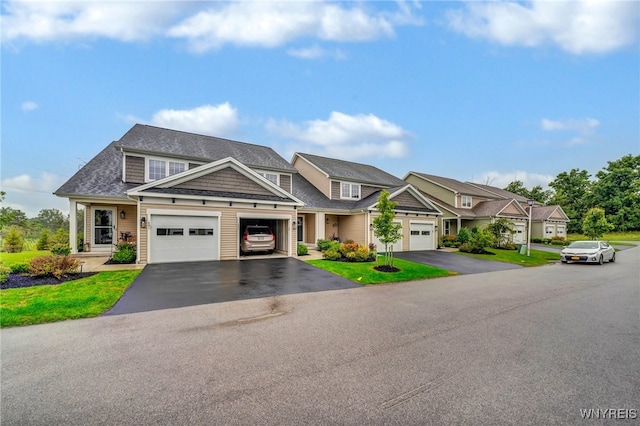 craftsman inspired home with a garage