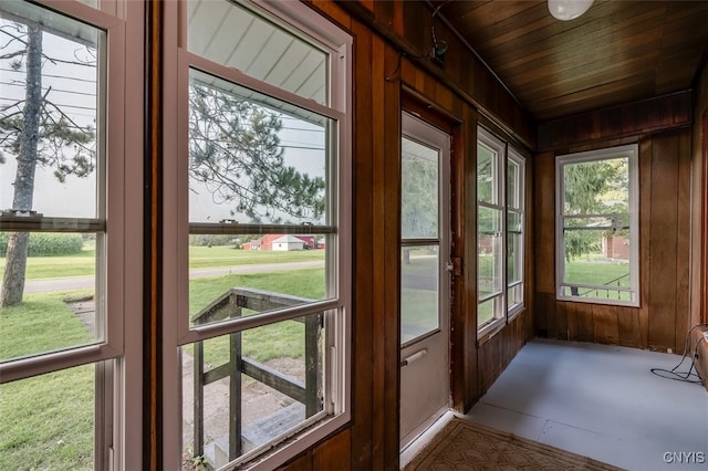 unfurnished sunroom with a healthy amount of sunlight