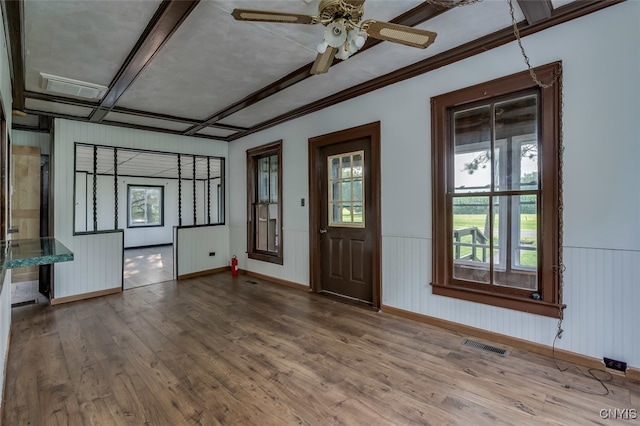 foyer featuring ceiling fan and hardwood / wood-style flooring