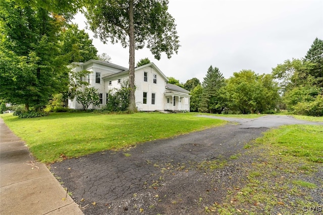 view of front of home with a front yard