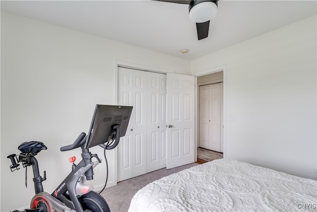 carpeted bedroom with a closet and ceiling fan