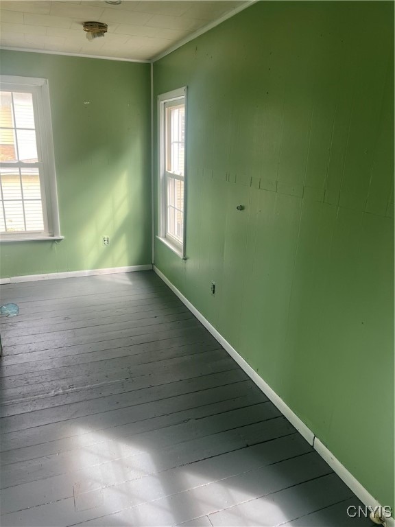 unfurnished room with light hardwood / wood-style floors