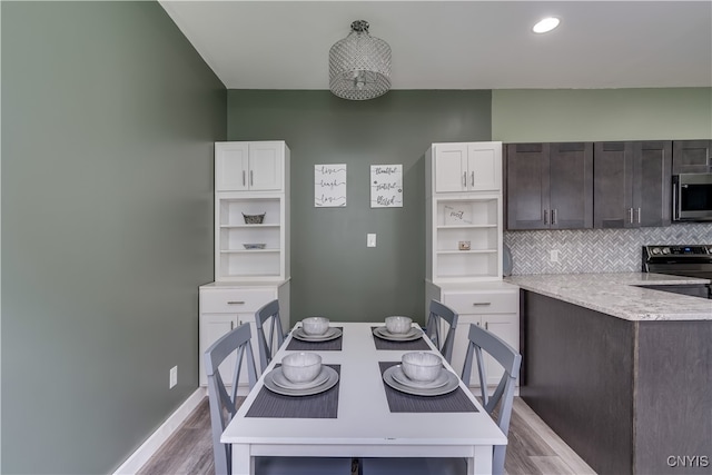 dining room featuring light wood-type flooring