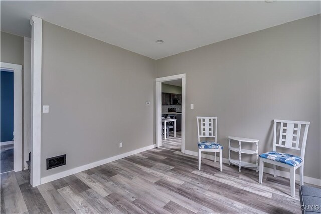 interior space with hardwood / wood-style flooring