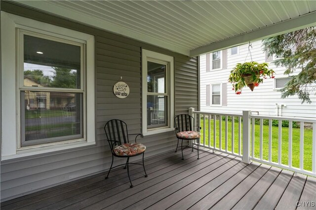 deck featuring a yard