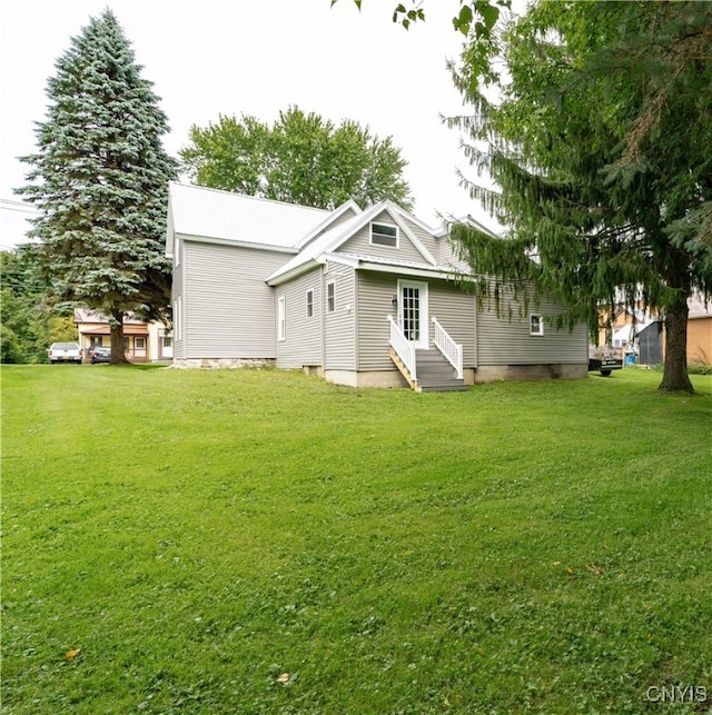 exterior space with a lawn