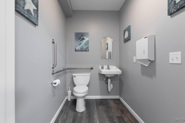 554 S 1st St, Fulton, NY 13069 - half bathroom with wood finished floors and toilet
