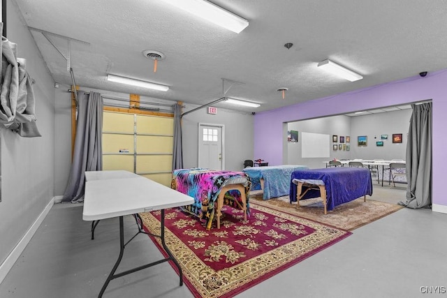 554 S 1st St, Fulton, NY 13069 - garage featuring baseboards