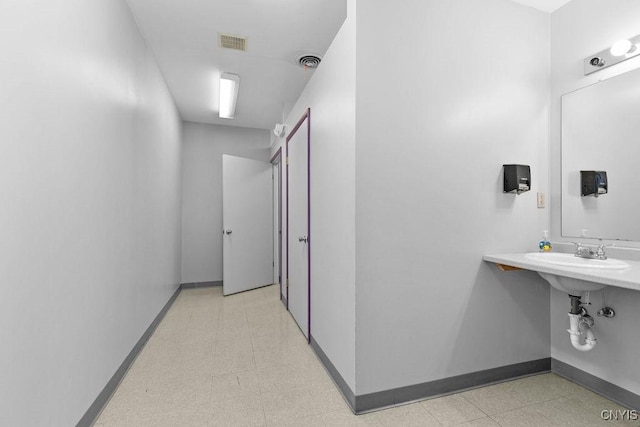 554 S 1st St, Fulton, NY 13069 - hallway with baseboards and light floors