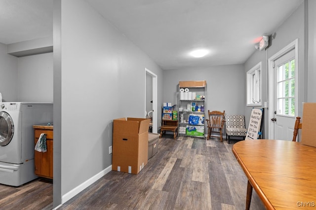 interior space with washer / clothes dryer and dark wood-type flooring