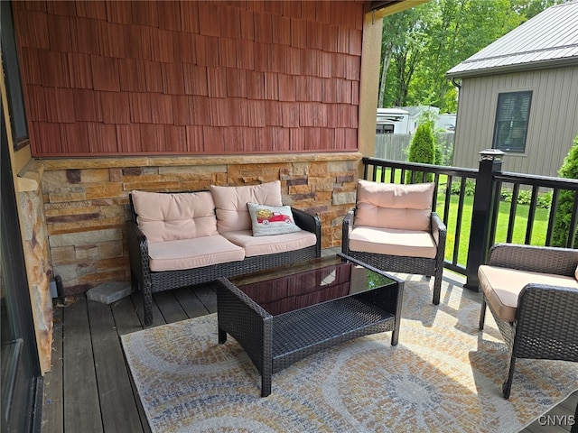 wooden deck with an outdoor hangout area