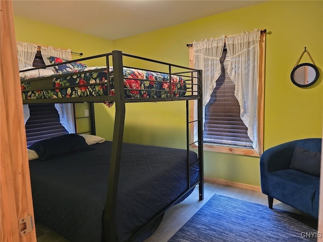 bedroom featuring wood-type flooring