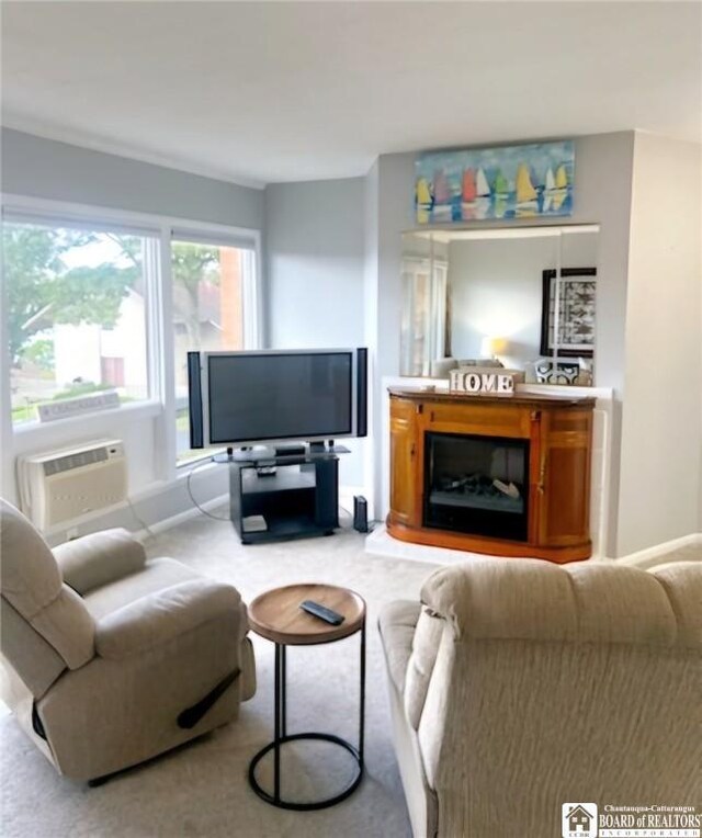 28 Mohawk Dr, Chautauqua, NY 14728 - living area with carpet flooring and baseboards