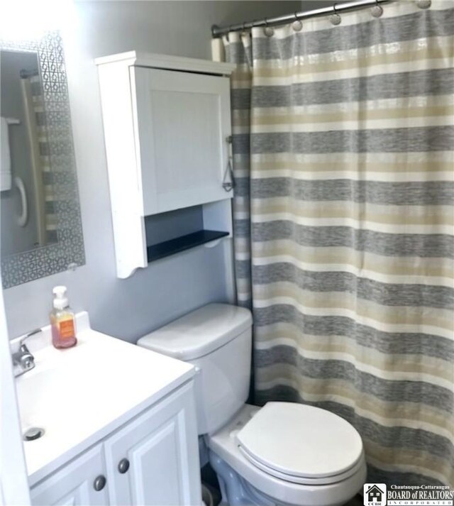 28 Mohawk Dr, Chautauqua, NY 14728 - bathroom featuring vanity and a shower with shower curtain