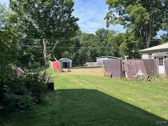 view of yard with a storage shed