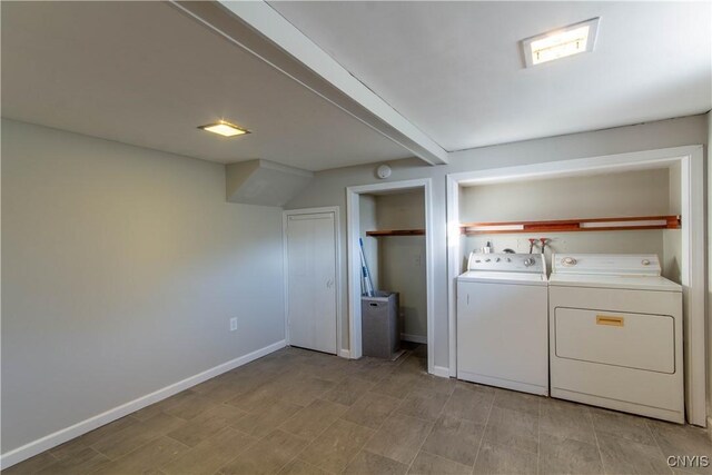 laundry room with washer and clothes dryer