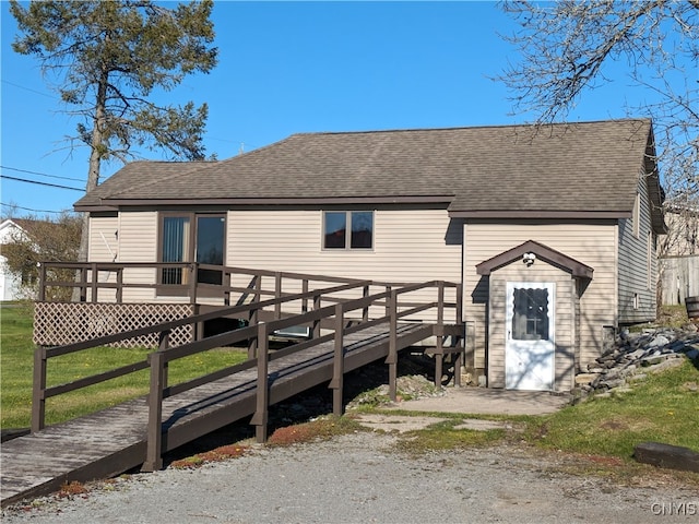 view of front of house featuring a wooden deck