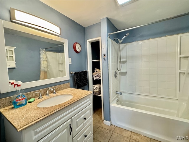 bathroom with vanity, tile patterned flooring, and tub / shower combination