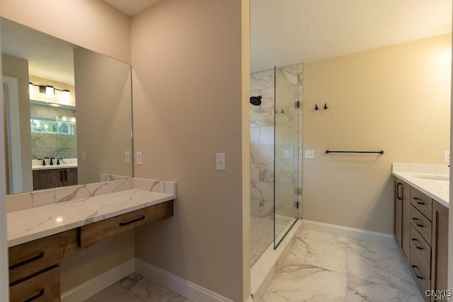 bathroom featuring tile patterned floors, a shower with door, and vanity