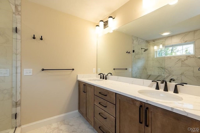 bathroom featuring a shower with door, tile patterned floors, and vanity