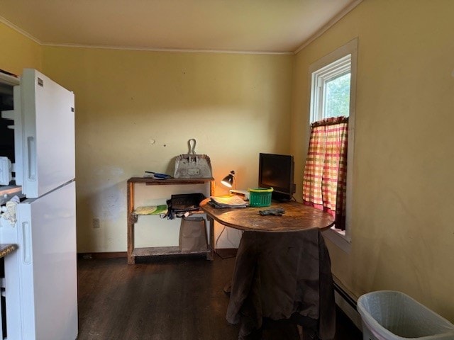 home office featuring hardwood / wood-style flooring and ornamental molding